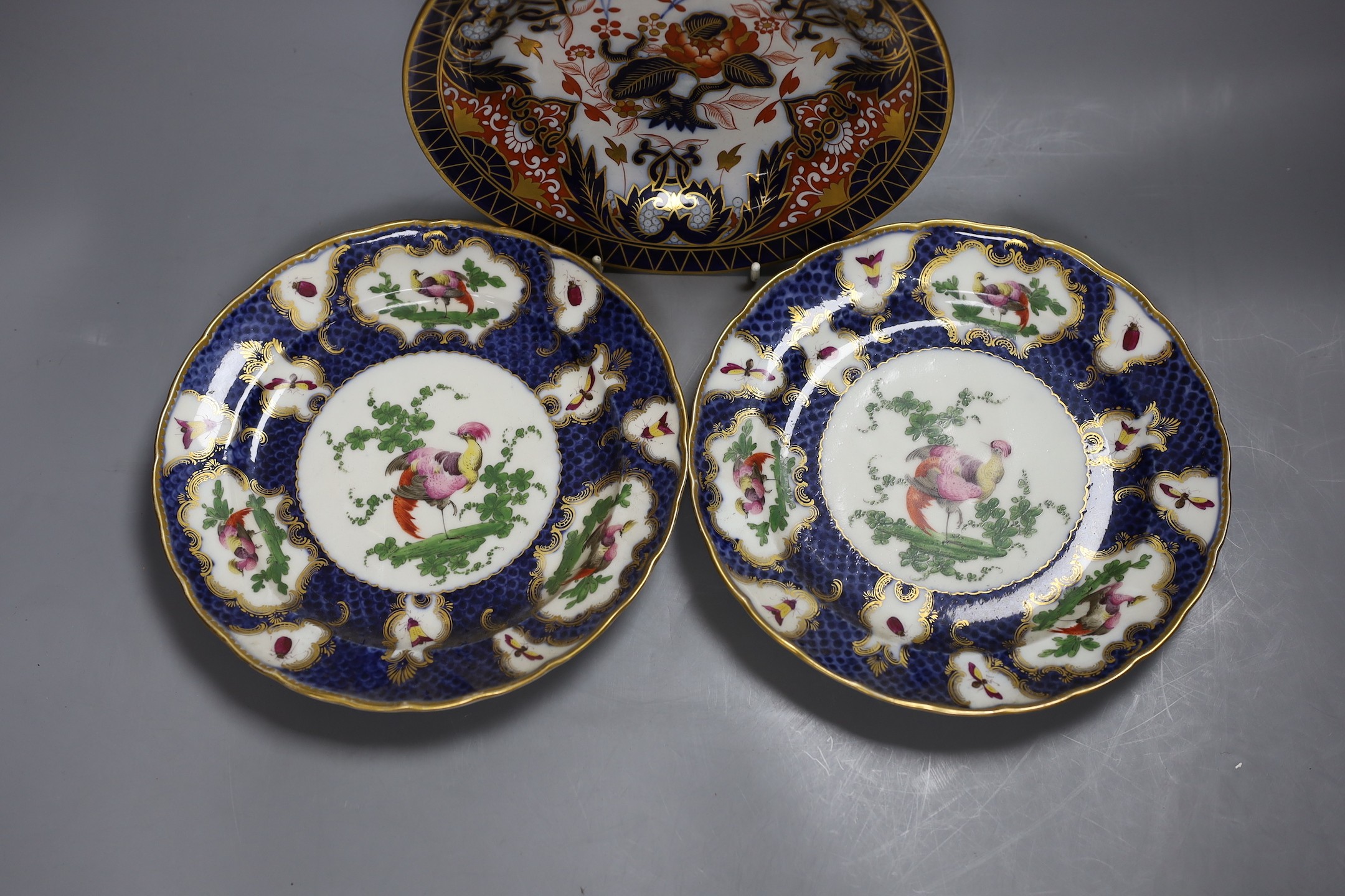 A pair of blue scale plates and an English Imari plate, 22cm